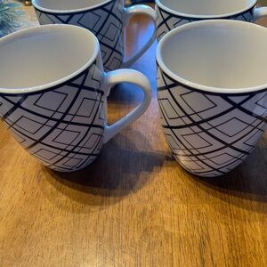 Set of 4 Dover $ York  mugs. New. Geometric pattern. Ceramic. D/w and M/W